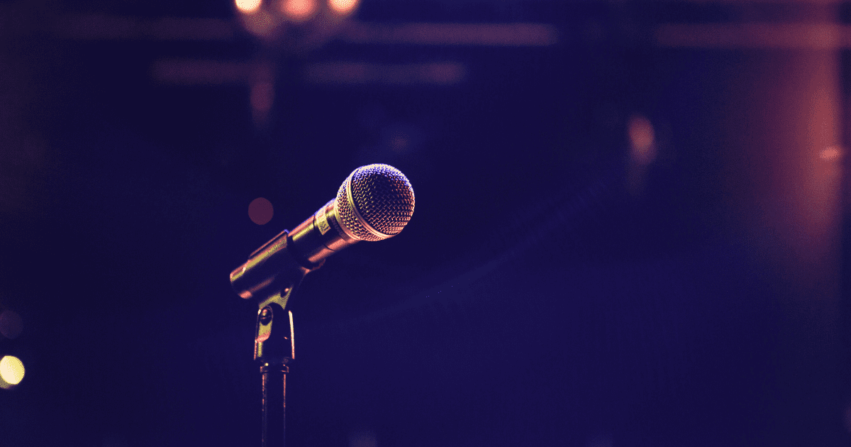 a closeup of a microphone on a stage