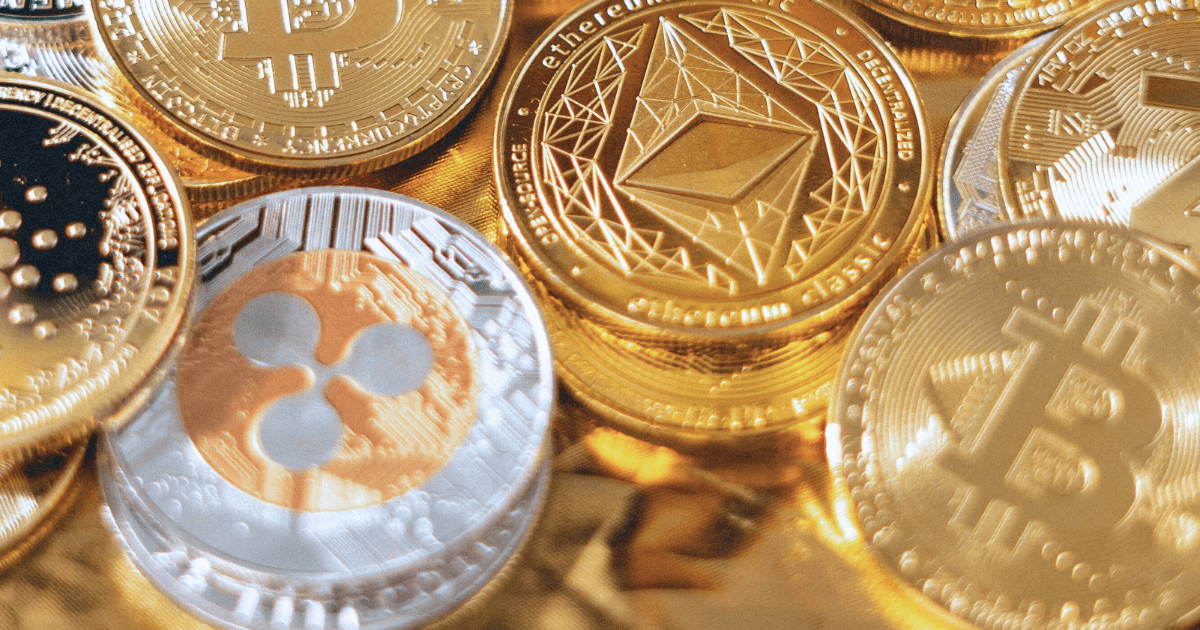 gold coins that are physical representations of digital cryptocurrency, with Bitcoin and Ethereum symbols on them